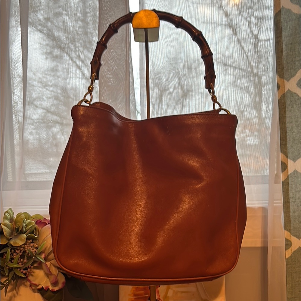 Pre-loved Gucci bamboo handbag in tan color. **Fixer***